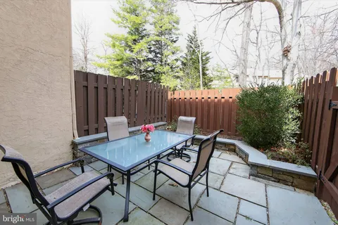 a view of a room with gym equipment and a window
