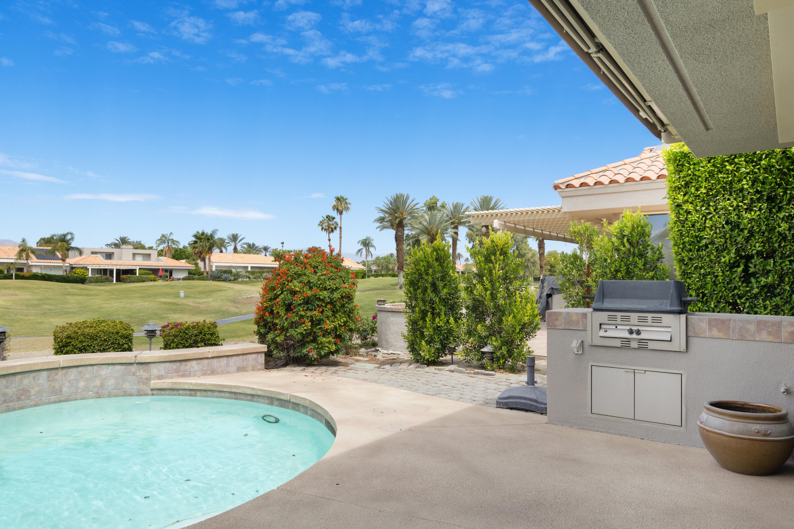 39 Augusta Drive Rancho Mirage, CA 92270 - Photo 43 of 53 a view of a swimming pool and outdoor space