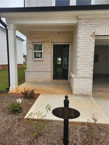 a view of a entryway door front of house