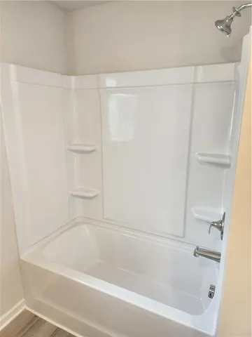 a bathroom with a bathtub