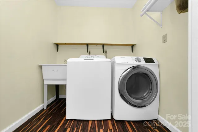 a utility room with dryer and washer