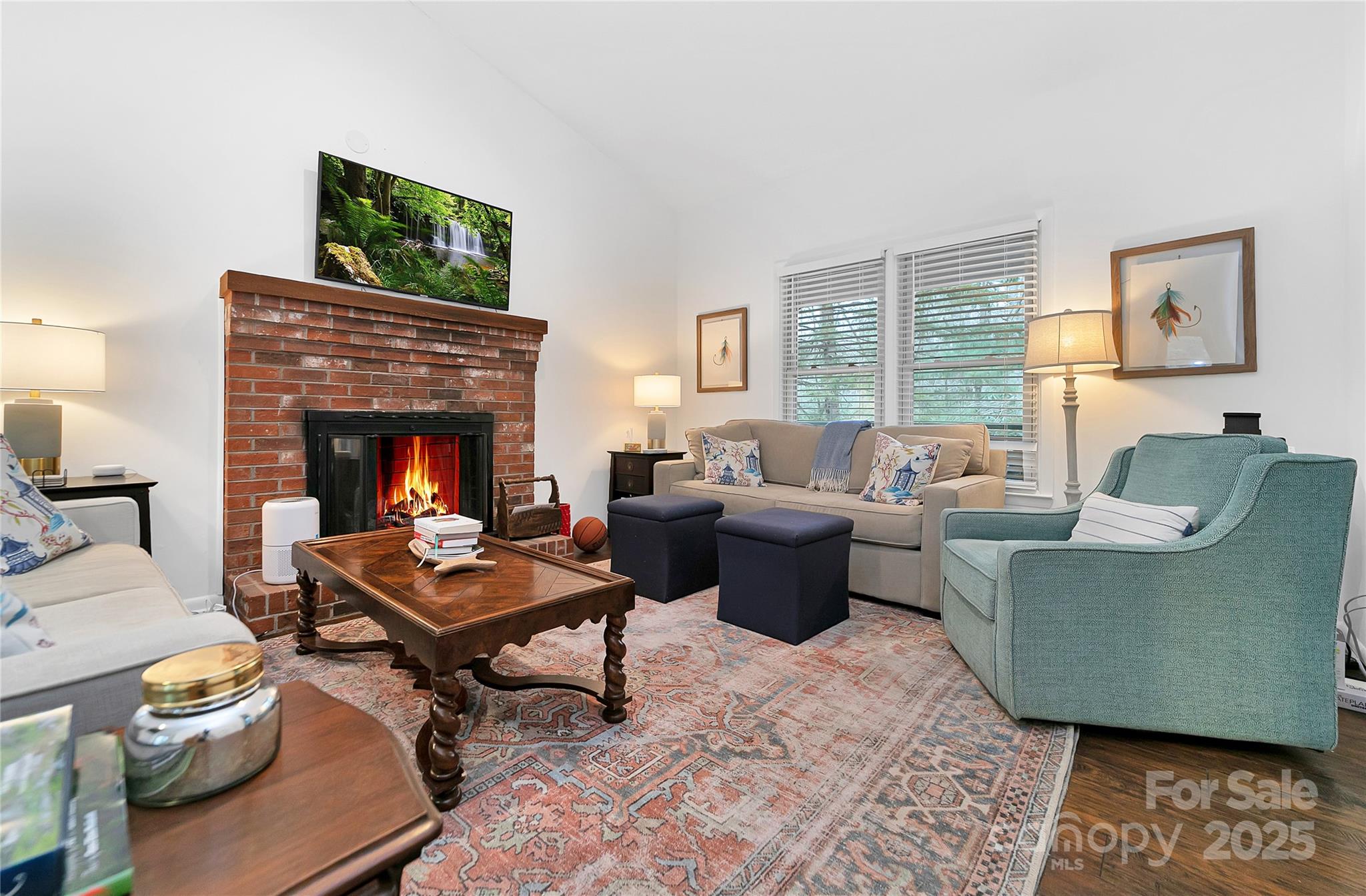3703 Connestee Trail Brevard, NC 28712 - Photo 5 of 38 a living room with furniture and a fireplace
