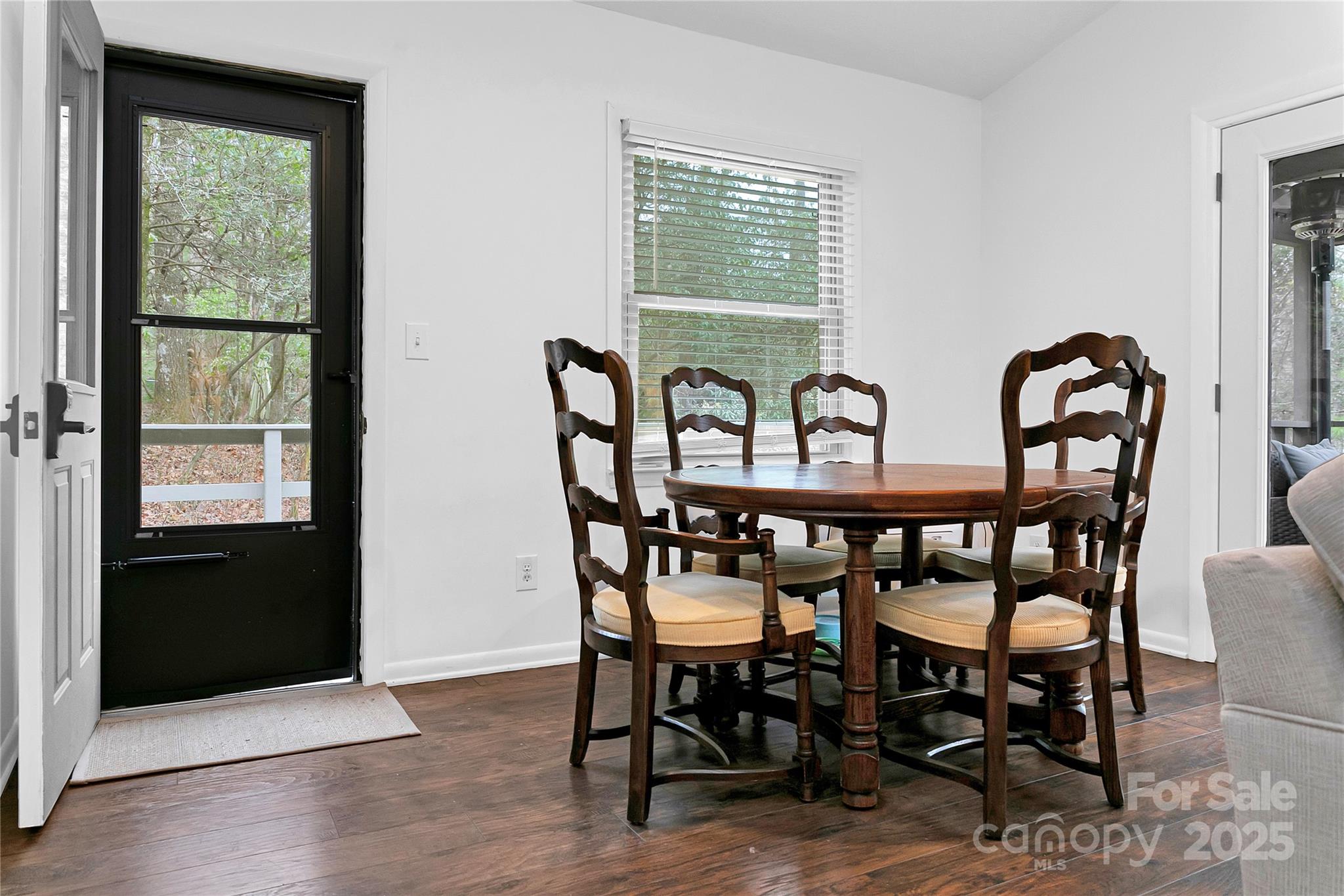 3703 Connestee Trail Brevard, NC 28712 - Photo 6 of 38 a view of a a dining room with furniture window and outside view