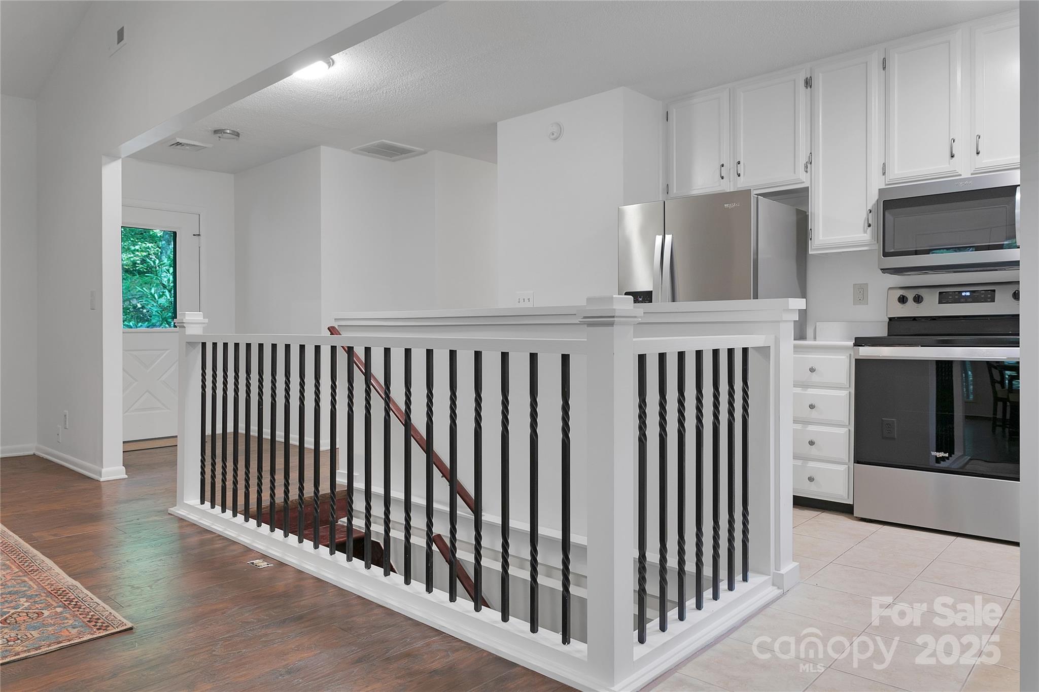 3703 Connestee Trail Brevard, NC 28712 - Photo 7 of 38 a view of a kitchen from the hallway