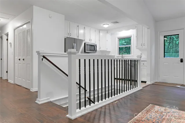 a view of kitchen with furniture and window