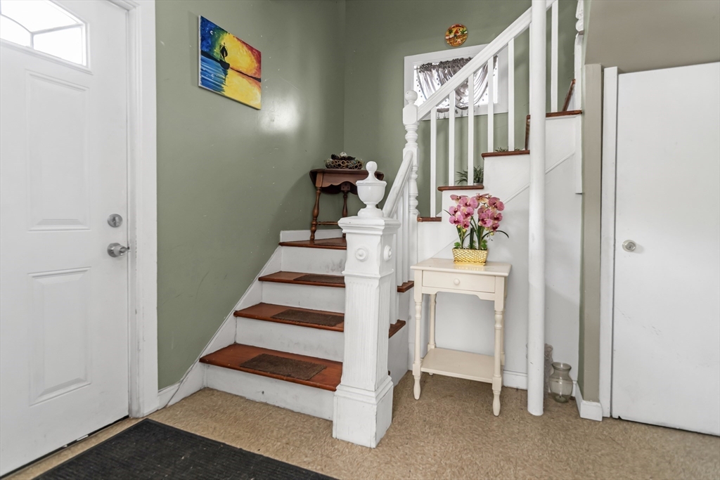 191 Farnham Street Lawrence, MA 01843 - Photo 4 of 31 a view of hallway with stairs and furniture