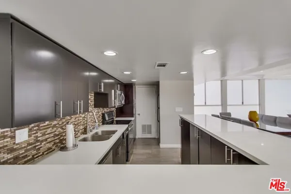 a large kitchen with lots of counter space