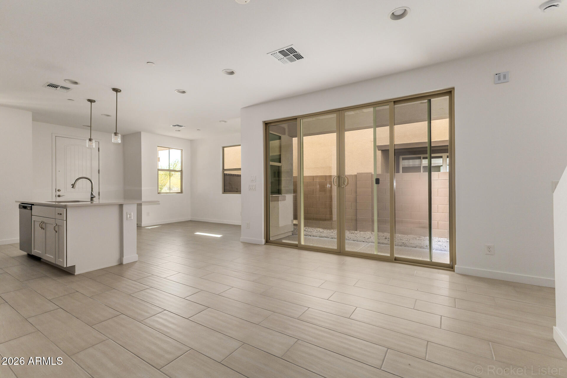 20618 West Thomas Road Buckeye, AZ 85396 - Photo 4 of 38 a view of an empty room with a window