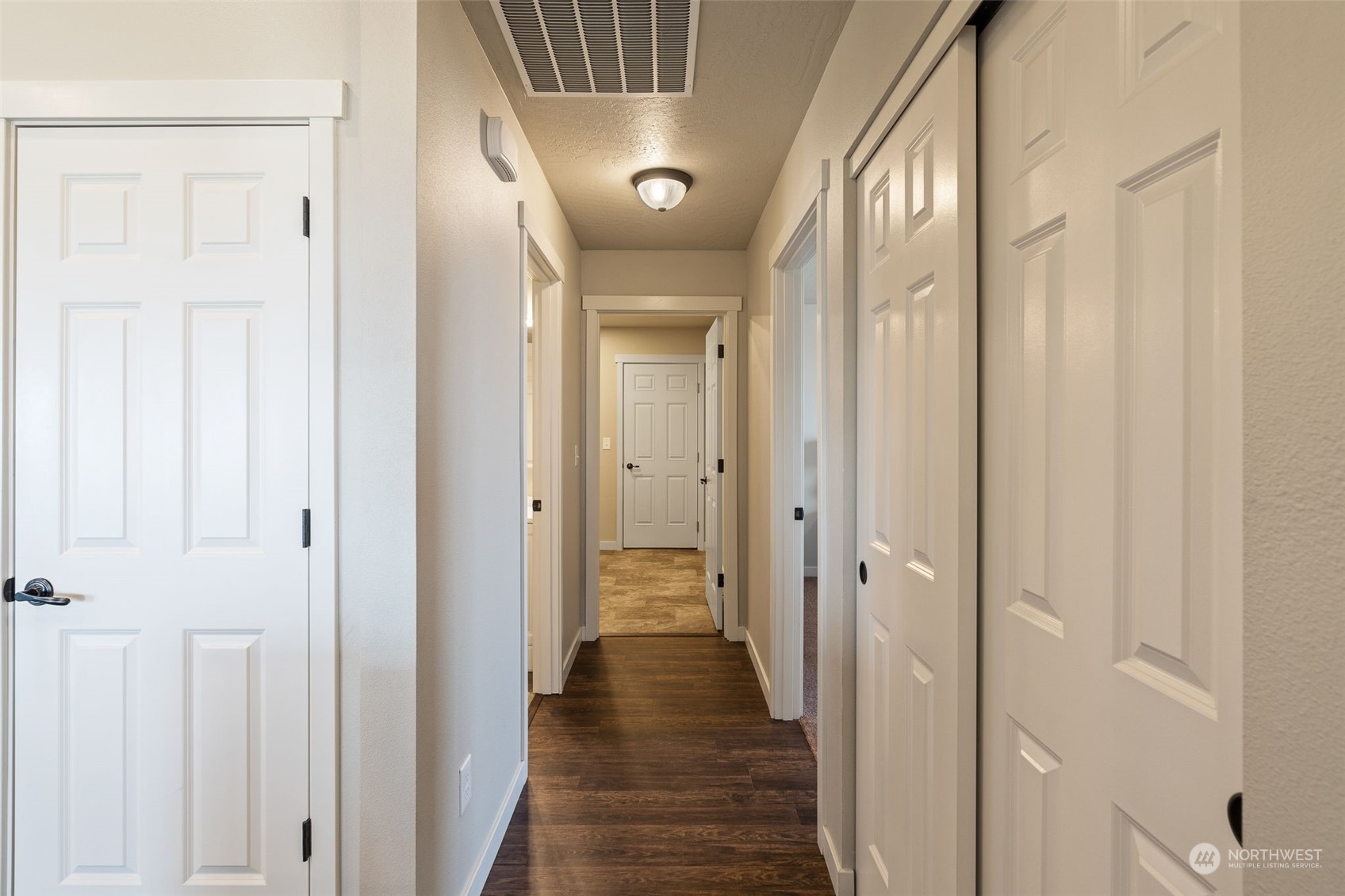 1003 North Klein Road Ritzville, WA 99169 - Photo 17 of 34 a view of a hallway with wooden floor and closet area