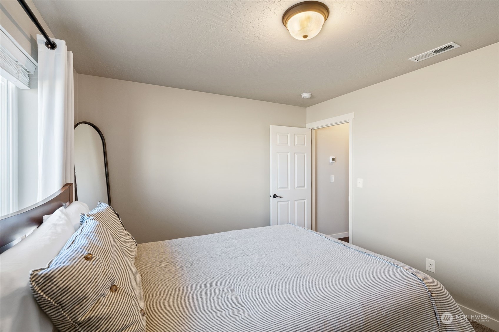 1003 North Klein Road Ritzville, WA 99169 - Photo 19 of 34 a bedroom with a bed and a couch
