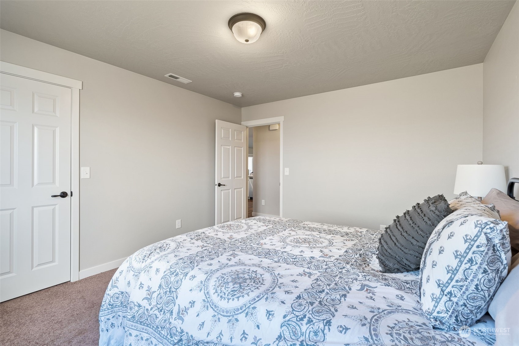 1003 North Klein Road Ritzville, WA 99169 - Photo 23 of 34 a bedroom with a bed and a window