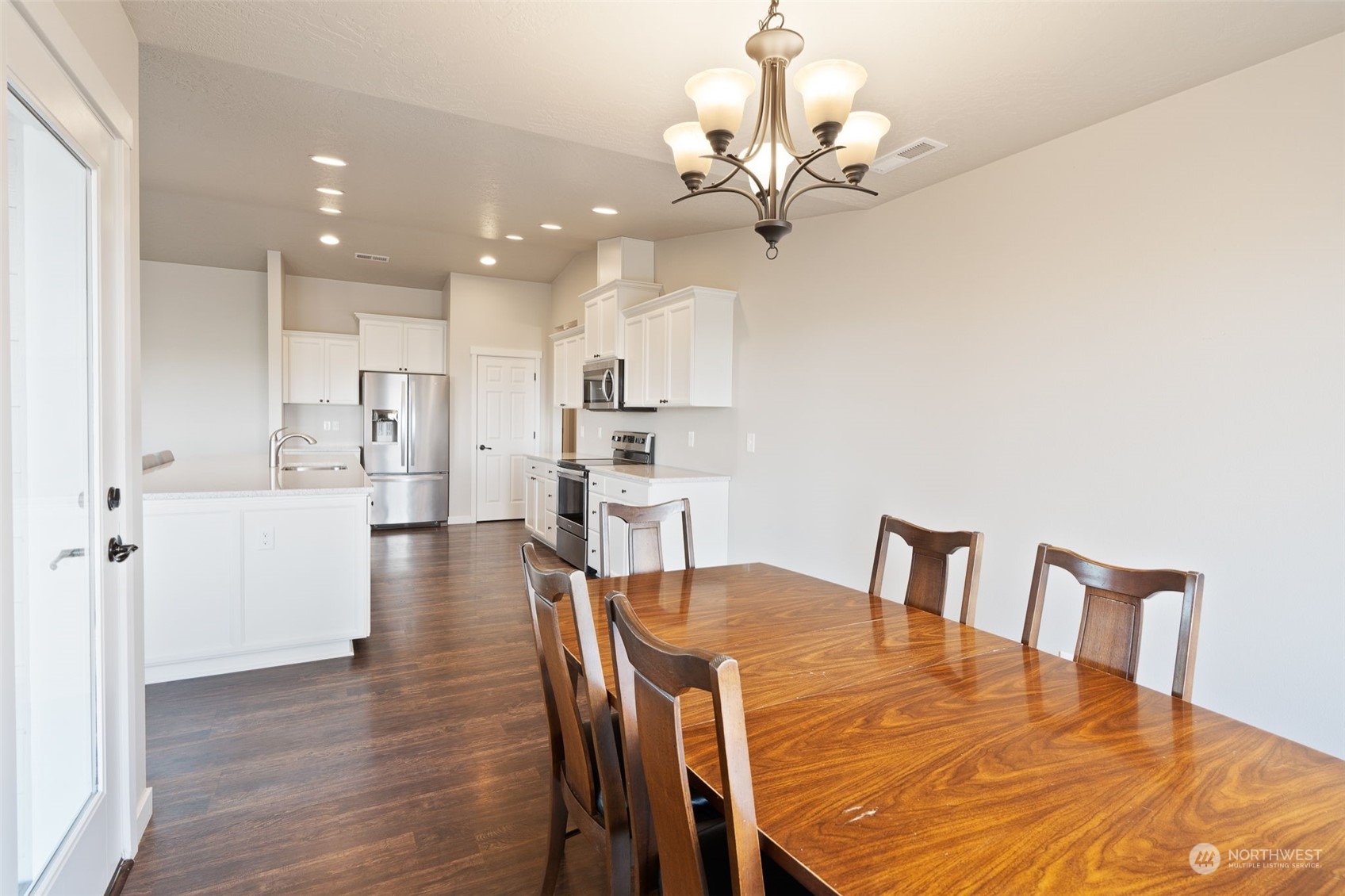 1003 North Klein Road Ritzville, WA 99169 - Photo 8 of 34 a view of a dining room with furniture and wooden floor