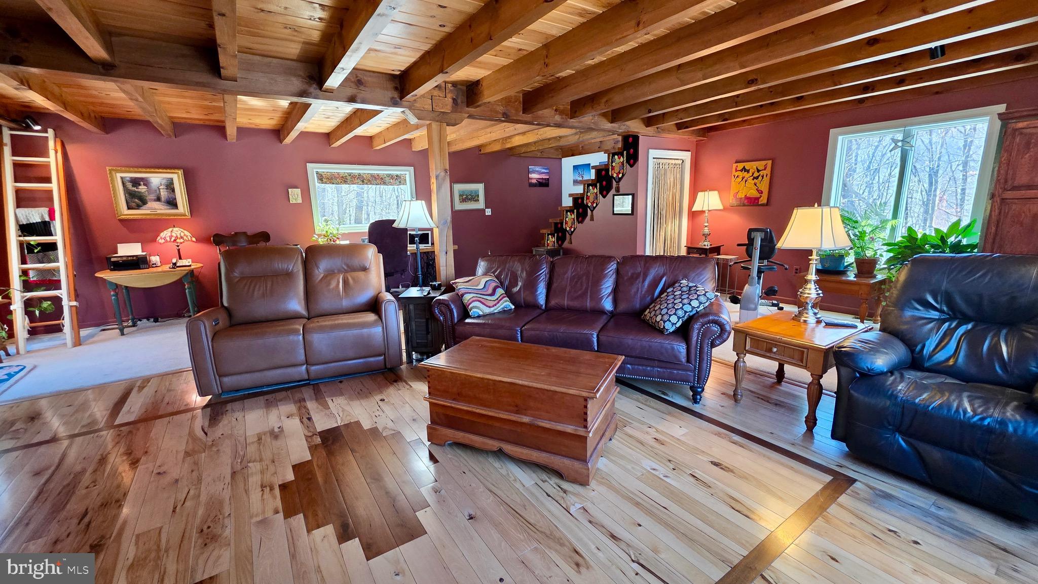 9206 Barkley Lane Huntingdon, PA 16652 - Photo 15 of 88 a living room with furniture and a chandelier