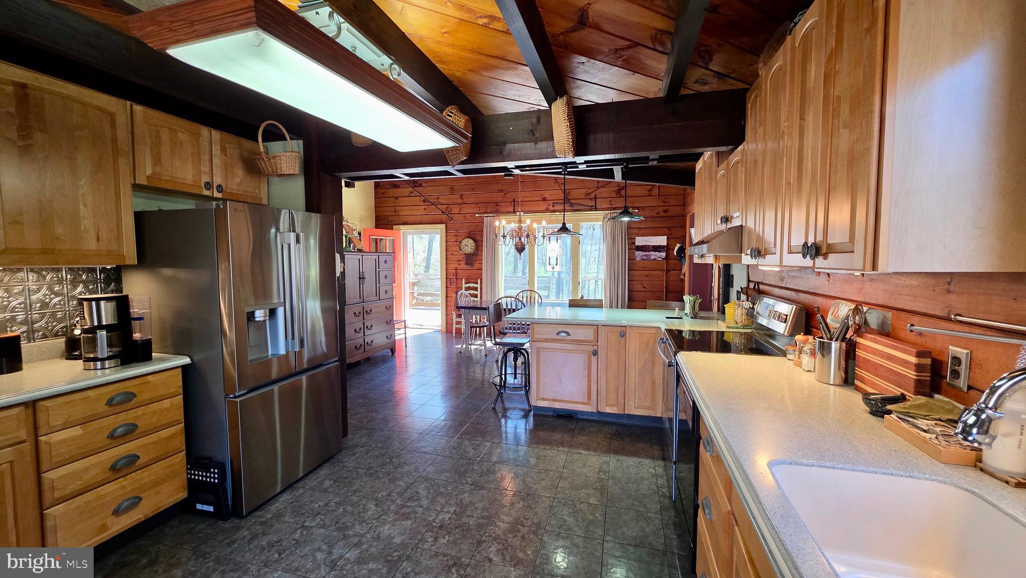 9206 Barkley Lane Huntingdon, PA 16652 - Photo 26 of 88 a kitchen with refrigerator and furniture