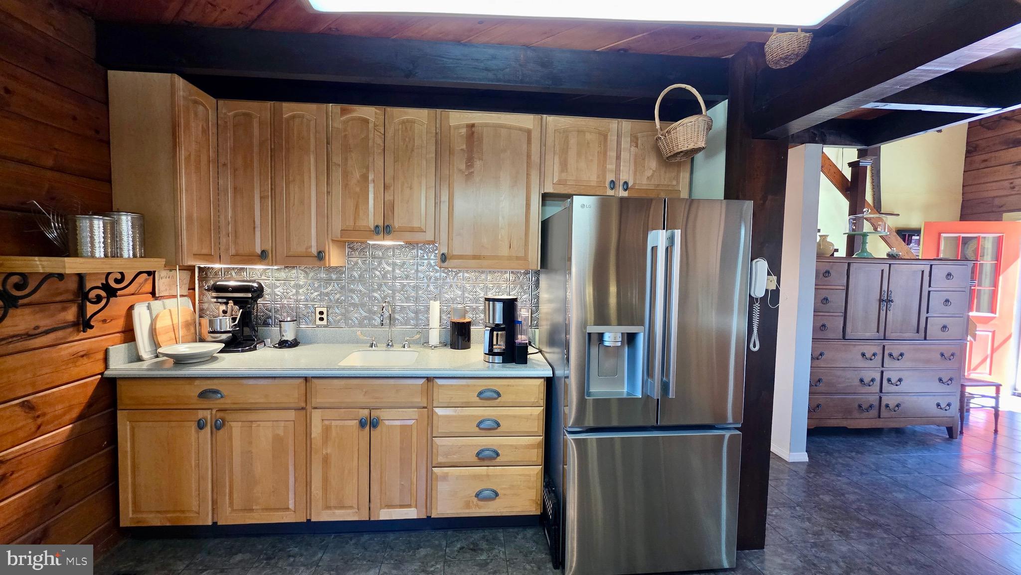 9206 Barkley Lane Huntingdon, PA 16652 - Photo 28 of 88 a kitchen with stainless steel appliances a refrigerator sink and cabinets