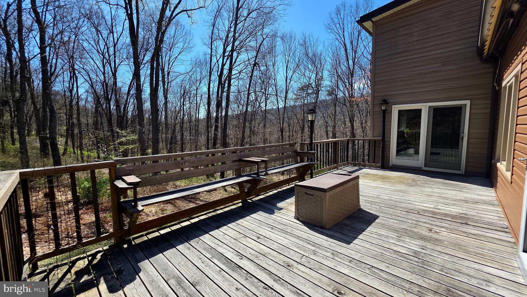 9206 Barkley Lane Huntingdon, PA 16652 - Photo 40 of 88 a view of a roof deck with wooden floor and fence