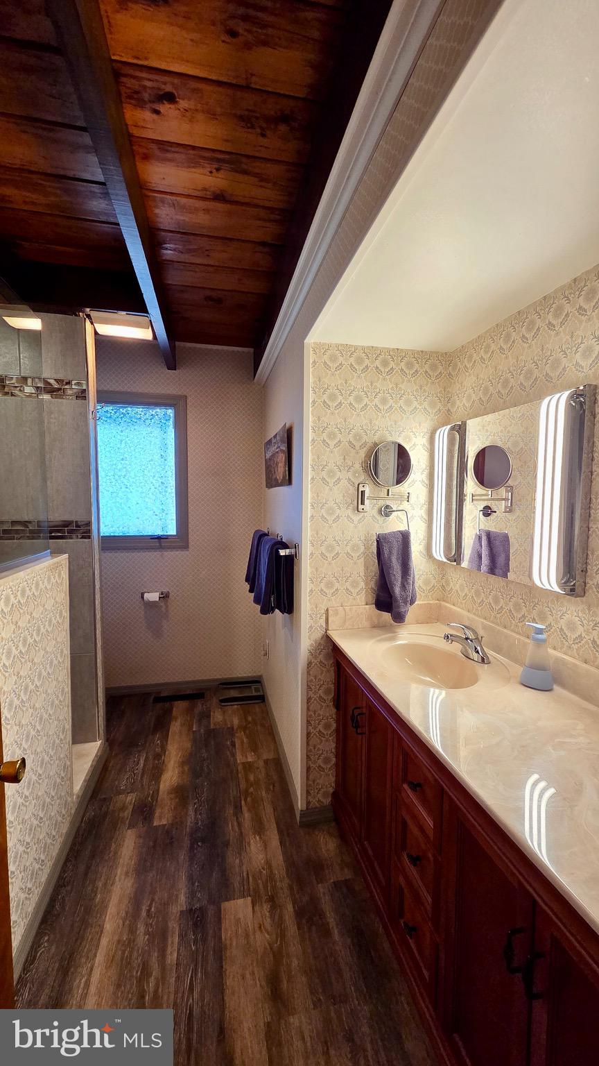 9206 Barkley Lane Huntingdon, PA 16652 - Photo 43 of 88 a bathroom with a sink and a mirror