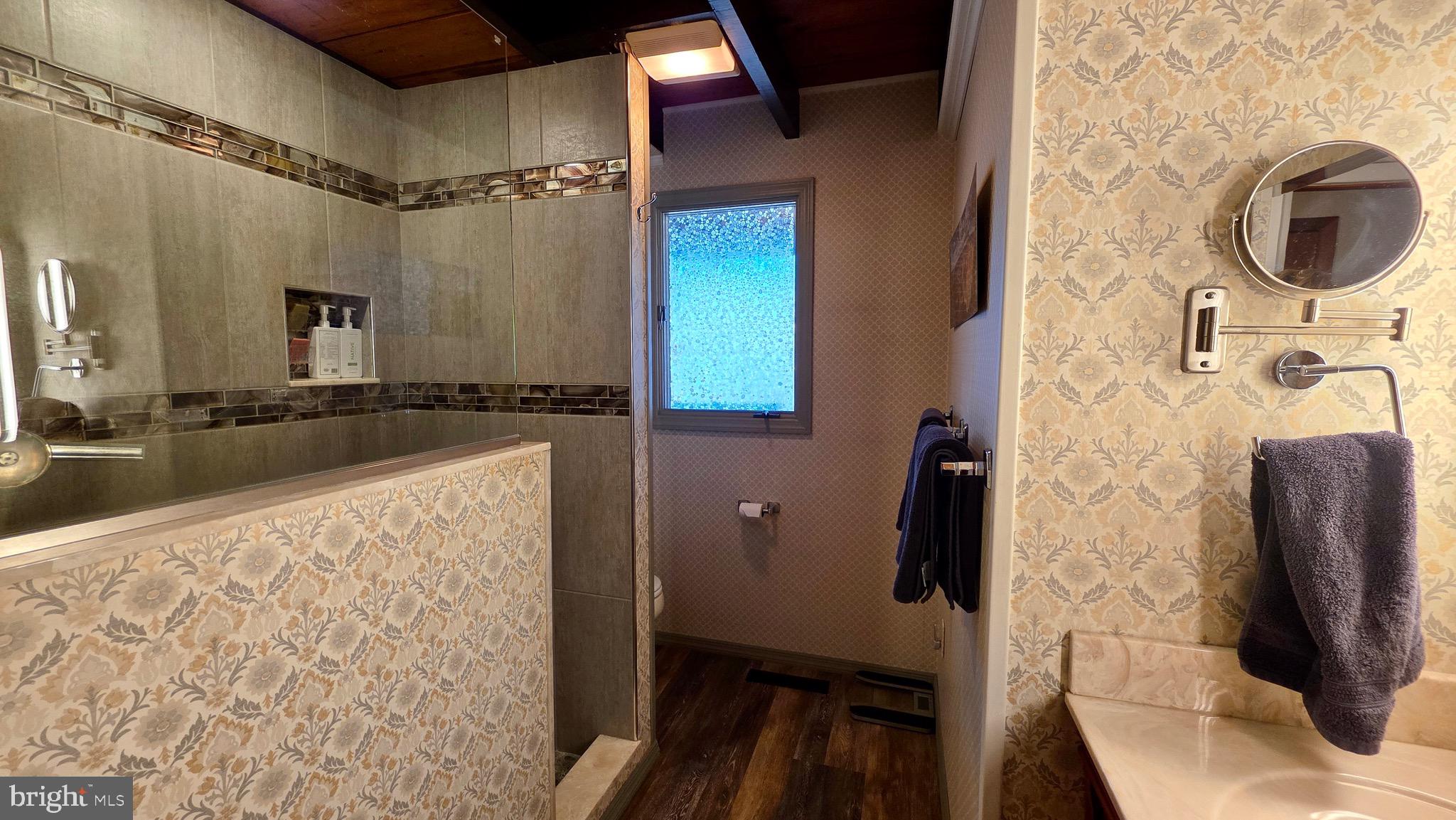 9206 Barkley Lane Huntingdon, PA 16652 - Photo 44 of 88 a bathroom with a sink and a mirror