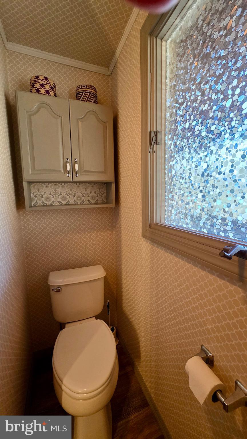 9206 Barkley Lane Huntingdon, PA 16652 - Photo 47 of 88 a bathroom with a toilet sink and mirror