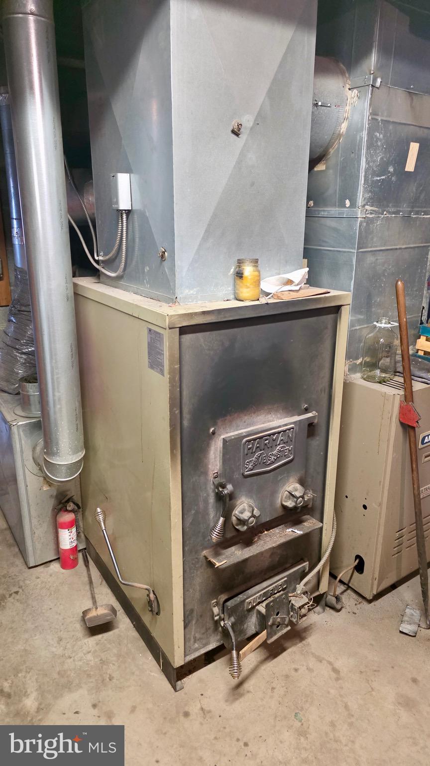 9206 Barkley Lane Huntingdon, PA 16652 - Photo 87 of 88 a room with water heater and a cabinet