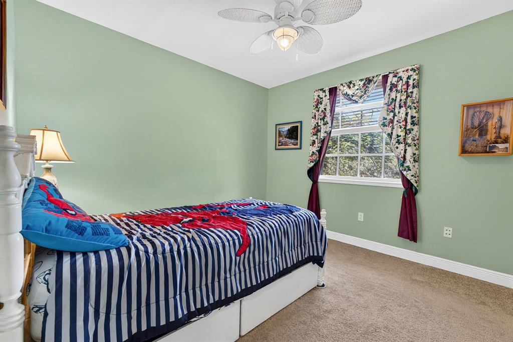 400 Northeast 8th Avenue Fort Lauderdale, FL 33301 - Photo 13 of 25 a bedroom with a bed and a painting on the wall