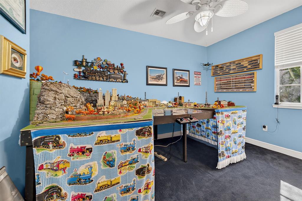 400 Northeast 8th Avenue Fort Lauderdale, FL 33301 - Photo 15 of 25 a view of a dining room with furniture and chandelier