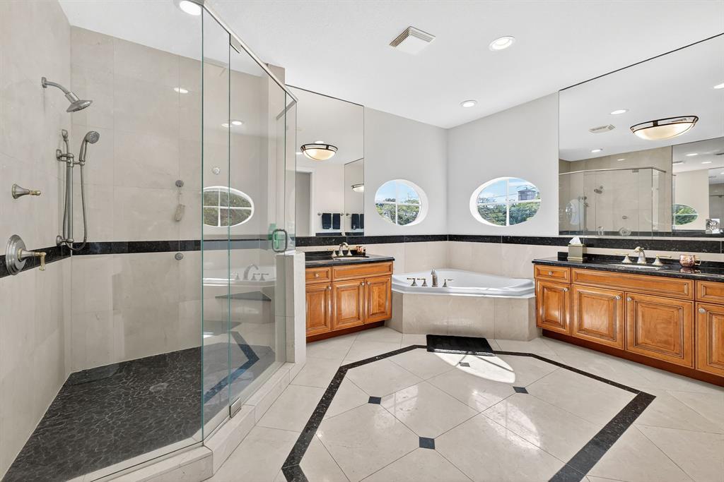 400 Northeast 8th Avenue Fort Lauderdale, FL 33301 - Photo 17 of 25 a bathroom with a tub sink vanity granite and a shower