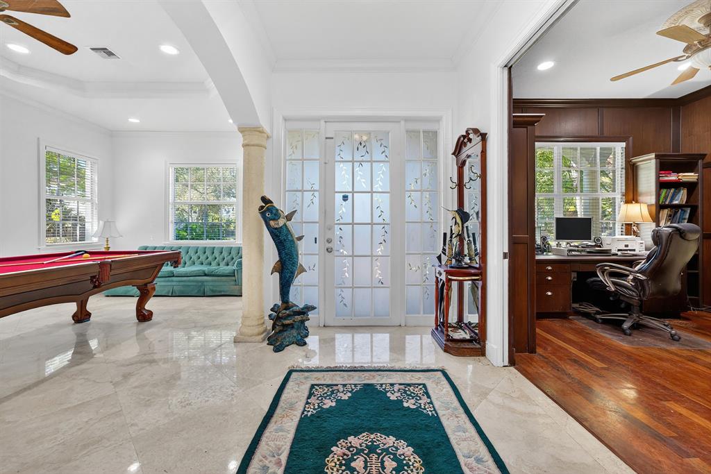 400 Northeast 8th Avenue Fort Lauderdale, FL 33301 - Photo 2 of 25 a living room with furniture gym equipment and a large window