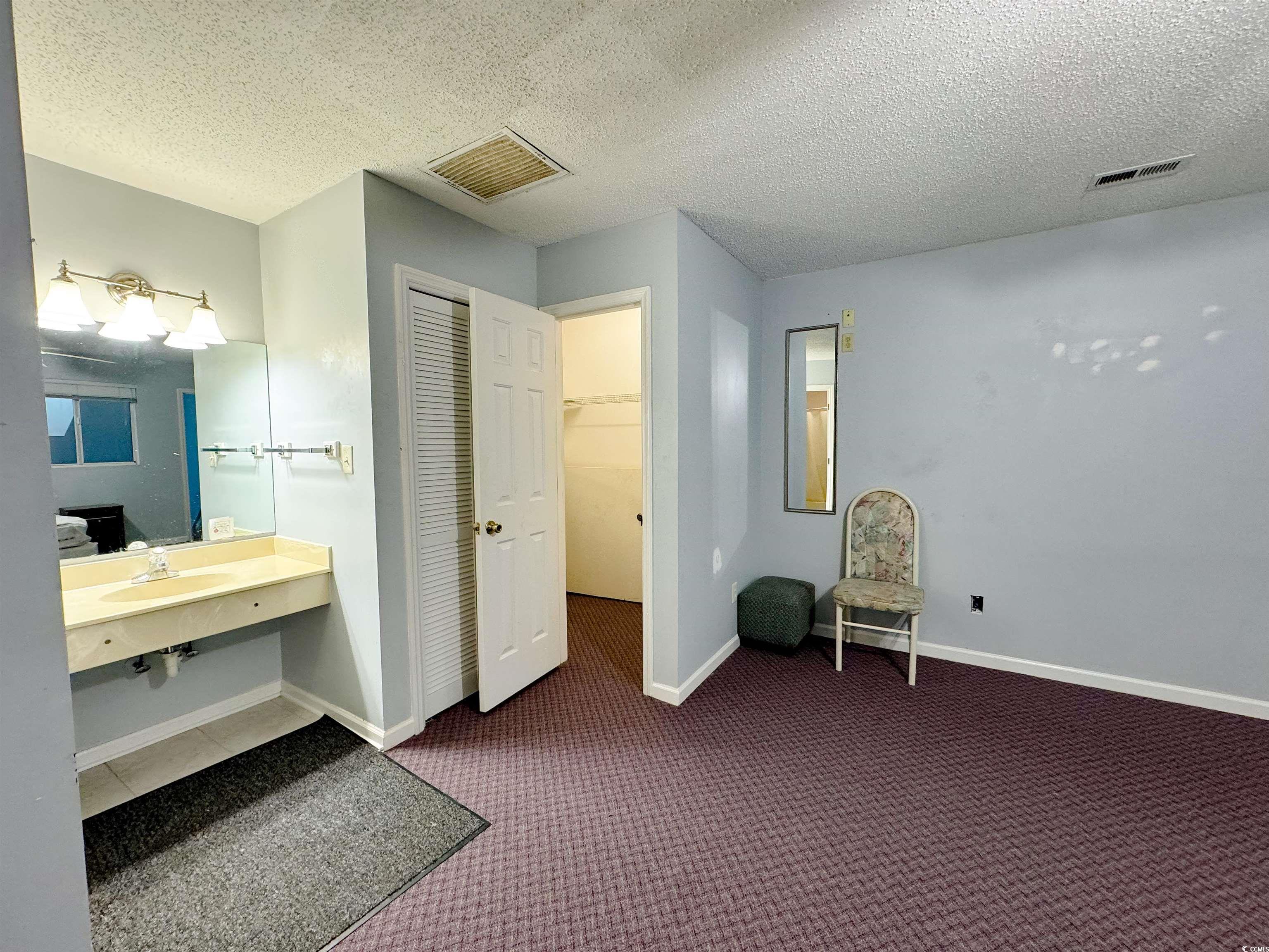 214 Double Eagle Drive, Unit B2 Myrtle Beach, SC 29575 - Photo 16 of 32 Attic access through this closet