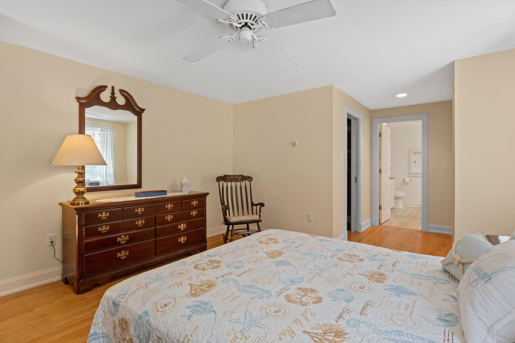 35 Hamblen Farm Road Wellfleet, MA 02667 - Photo 28 of 62 a bedroom with a bed and a dresser