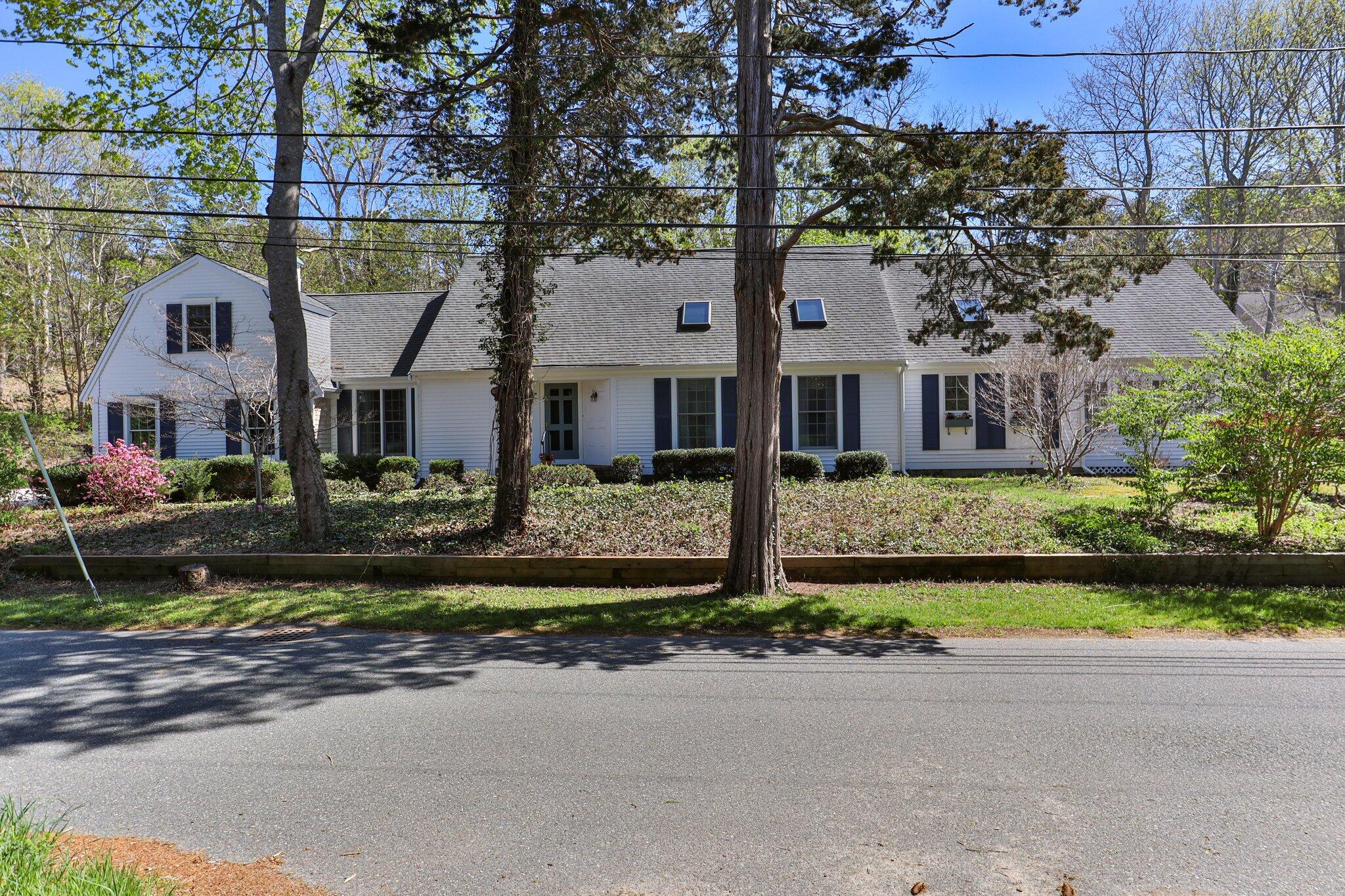 35 Hamblen Farm Road Wellfleet, MA 02667 - Photo 3 of 62 a front view of house with yard and green space