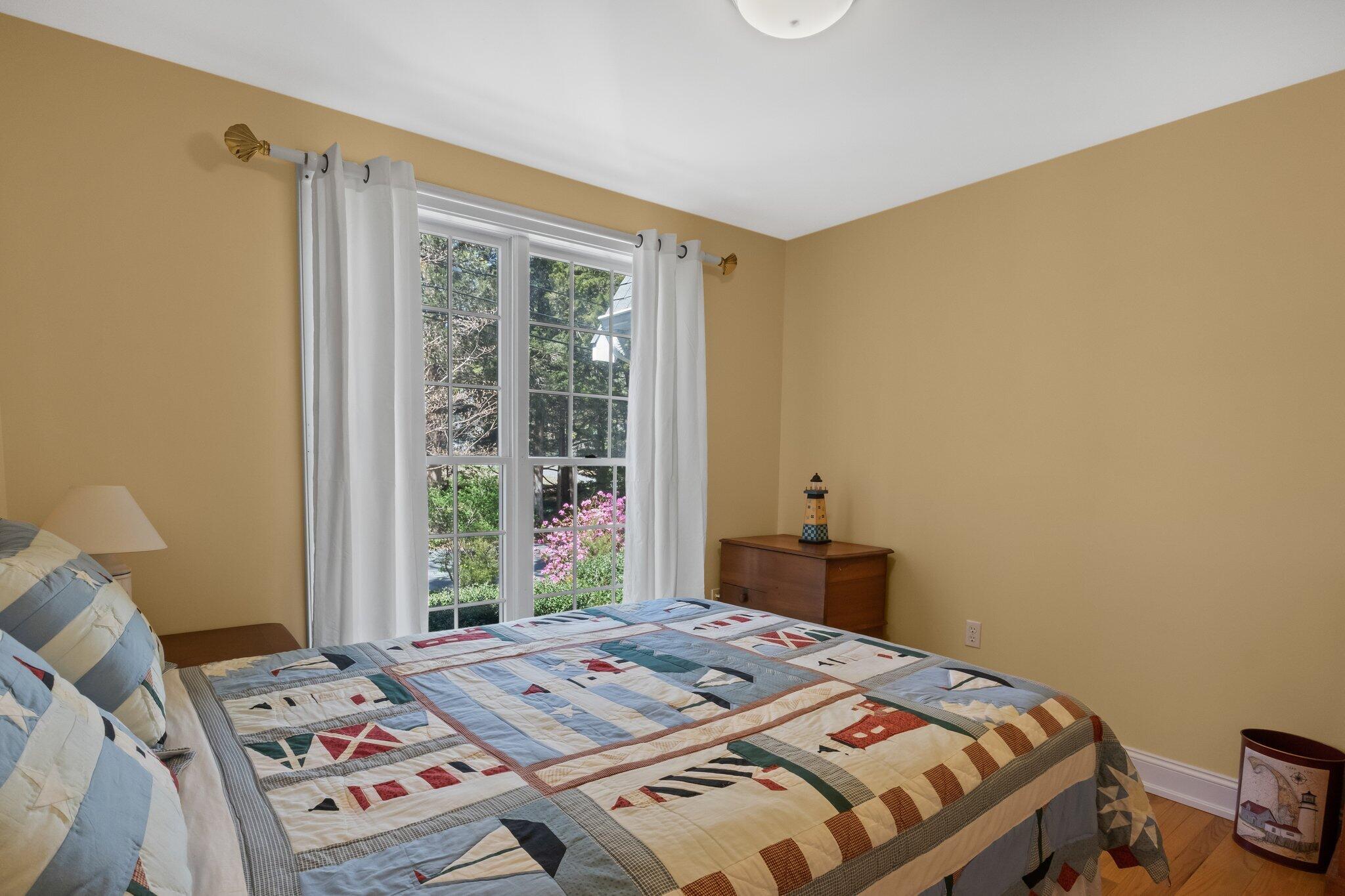 35 Hamblen Farm Road Wellfleet, MA 02667 - Photo 34 of 62 a bedroom with a bed and a window