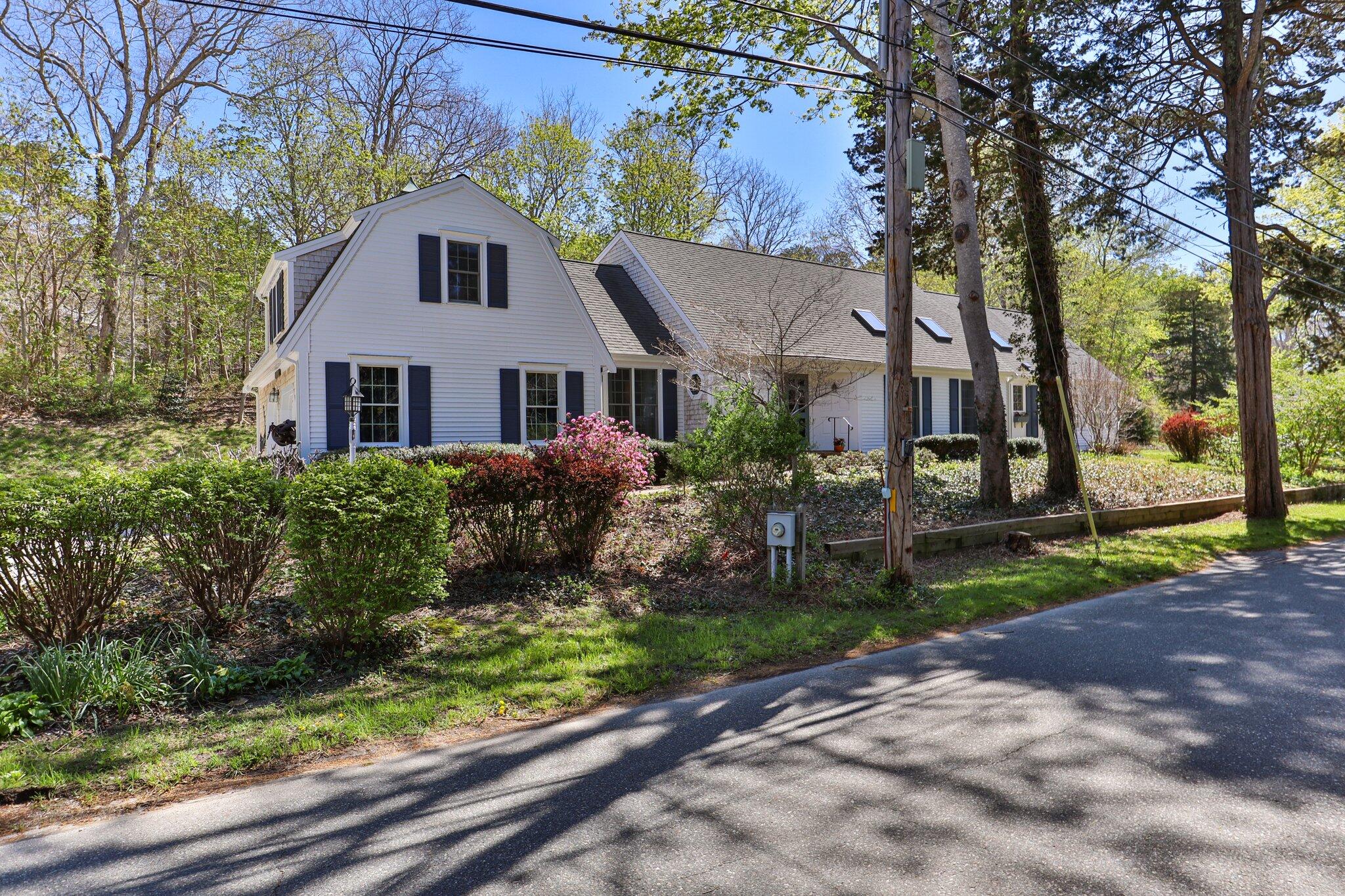 35 Hamblen Farm Road Wellfleet, MA 02667 - Photo 4 of 62 a front view of house with yard and green space