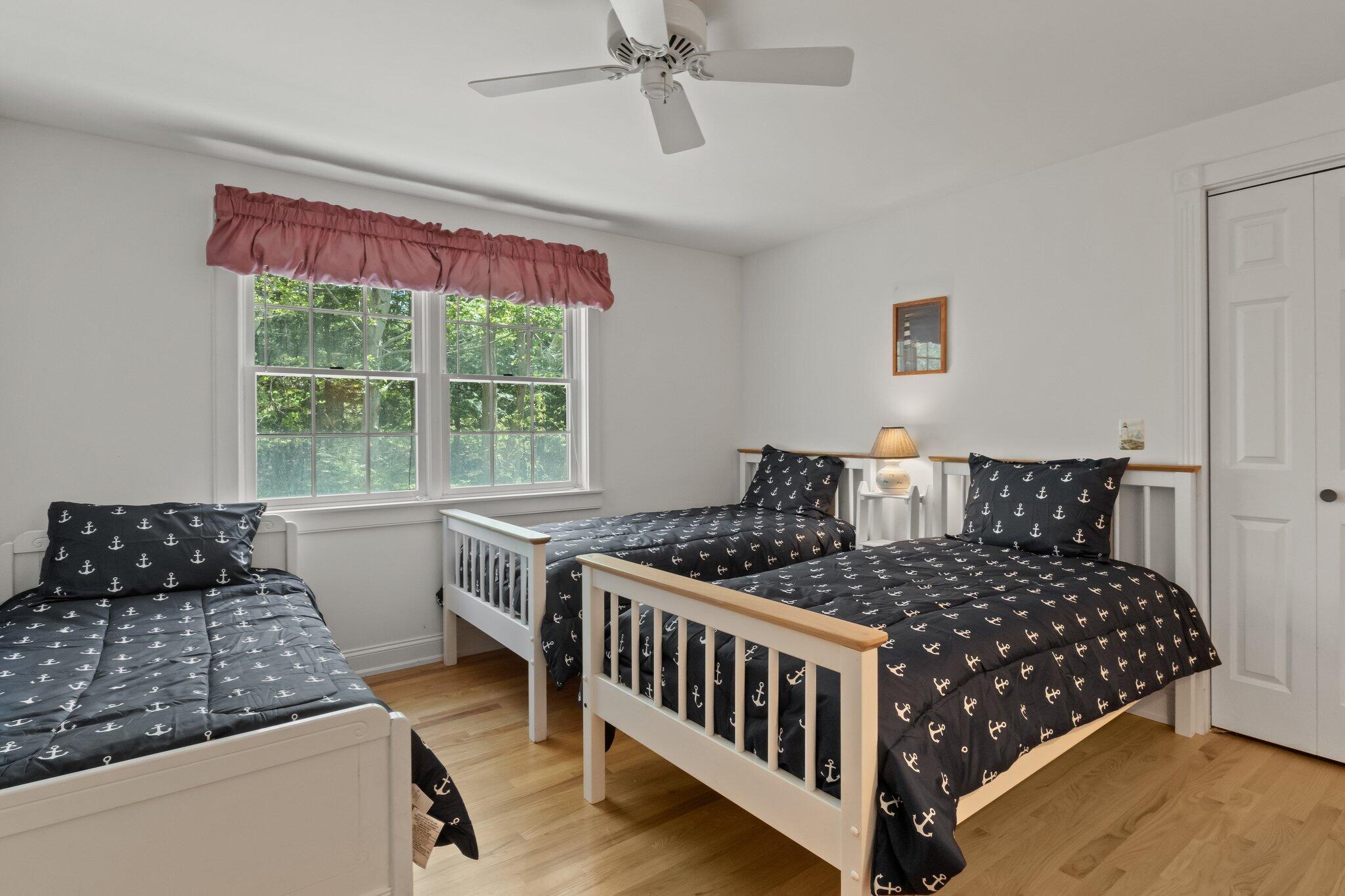 35 Hamblen Farm Road Wellfleet, MA 02667 - Photo 44 of 62 a bedroom with a bed and a window