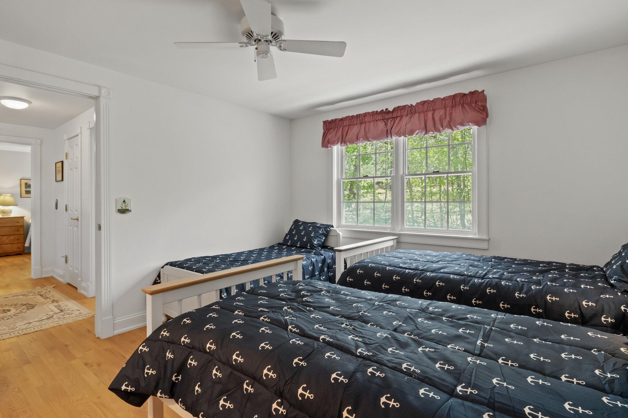 35 Hamblen Farm Road Wellfleet, MA 02667 - Photo 45 of 62 a bedroom with a bed and a window