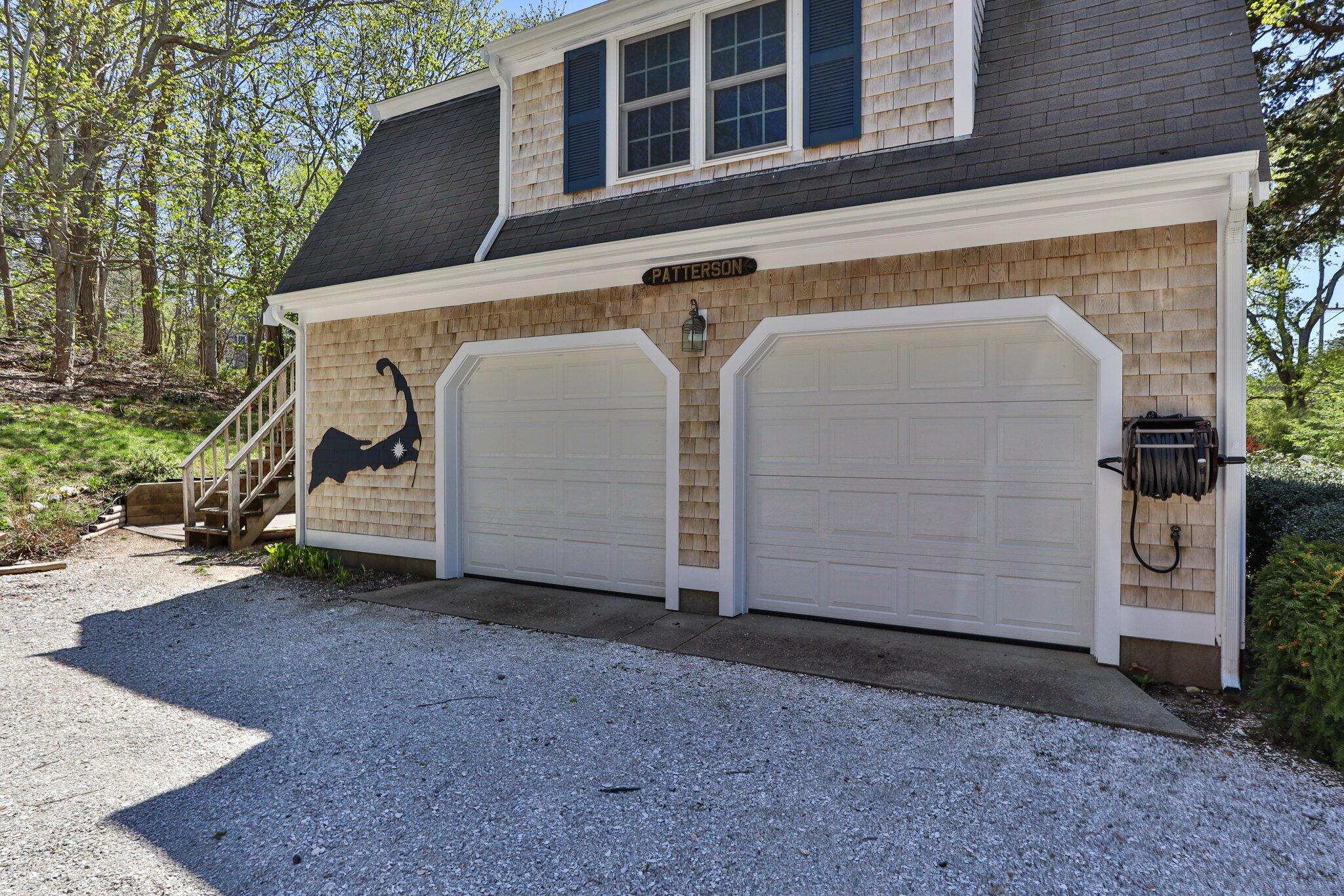 35 Hamblen Farm Road Wellfleet, MA 02667 - Photo 46 of 62 a view of a house with a garage
