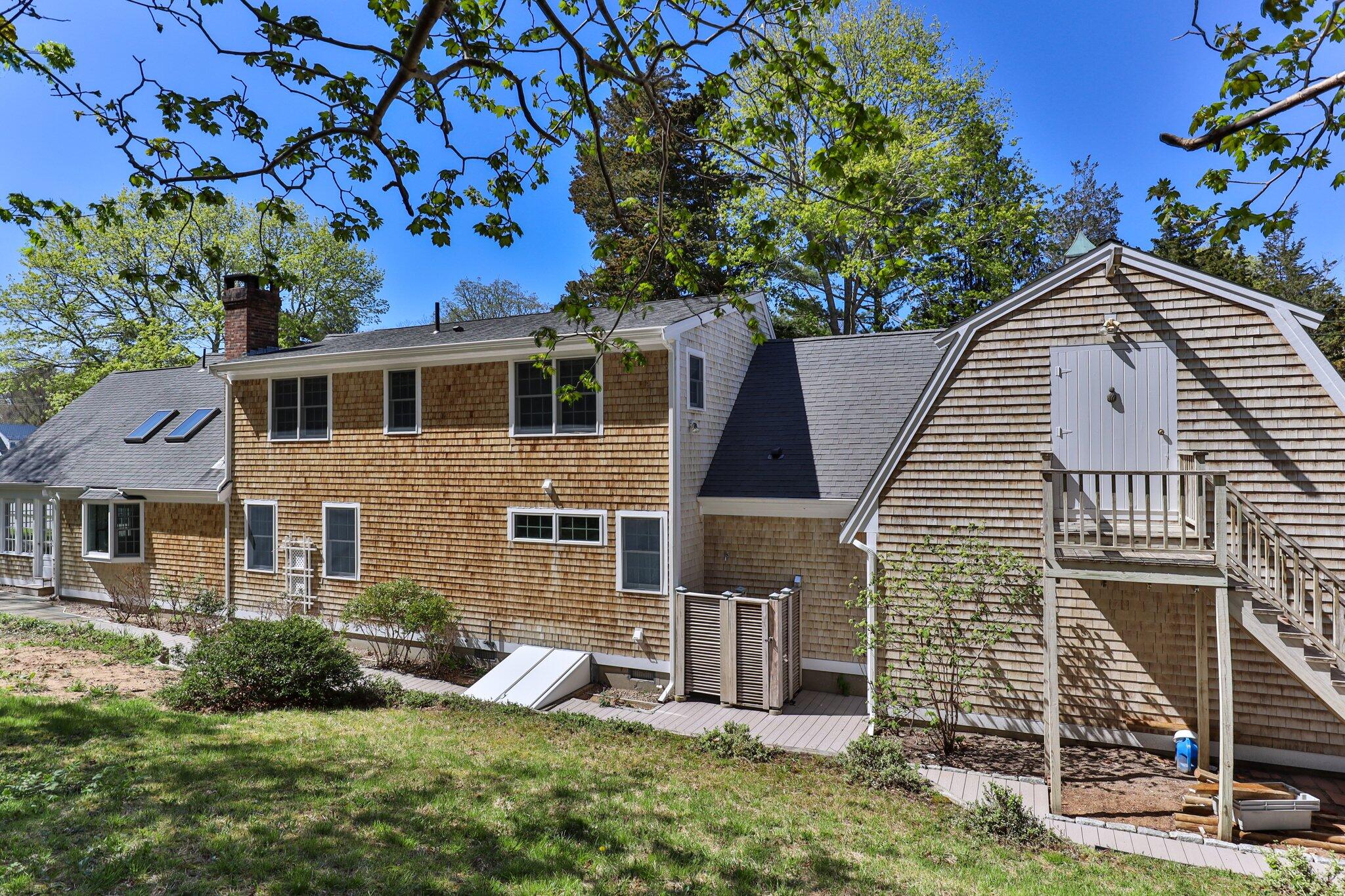 35 Hamblen Farm Road Wellfleet, MA 02667 - Photo 49 of 62 a front view of a house with garden