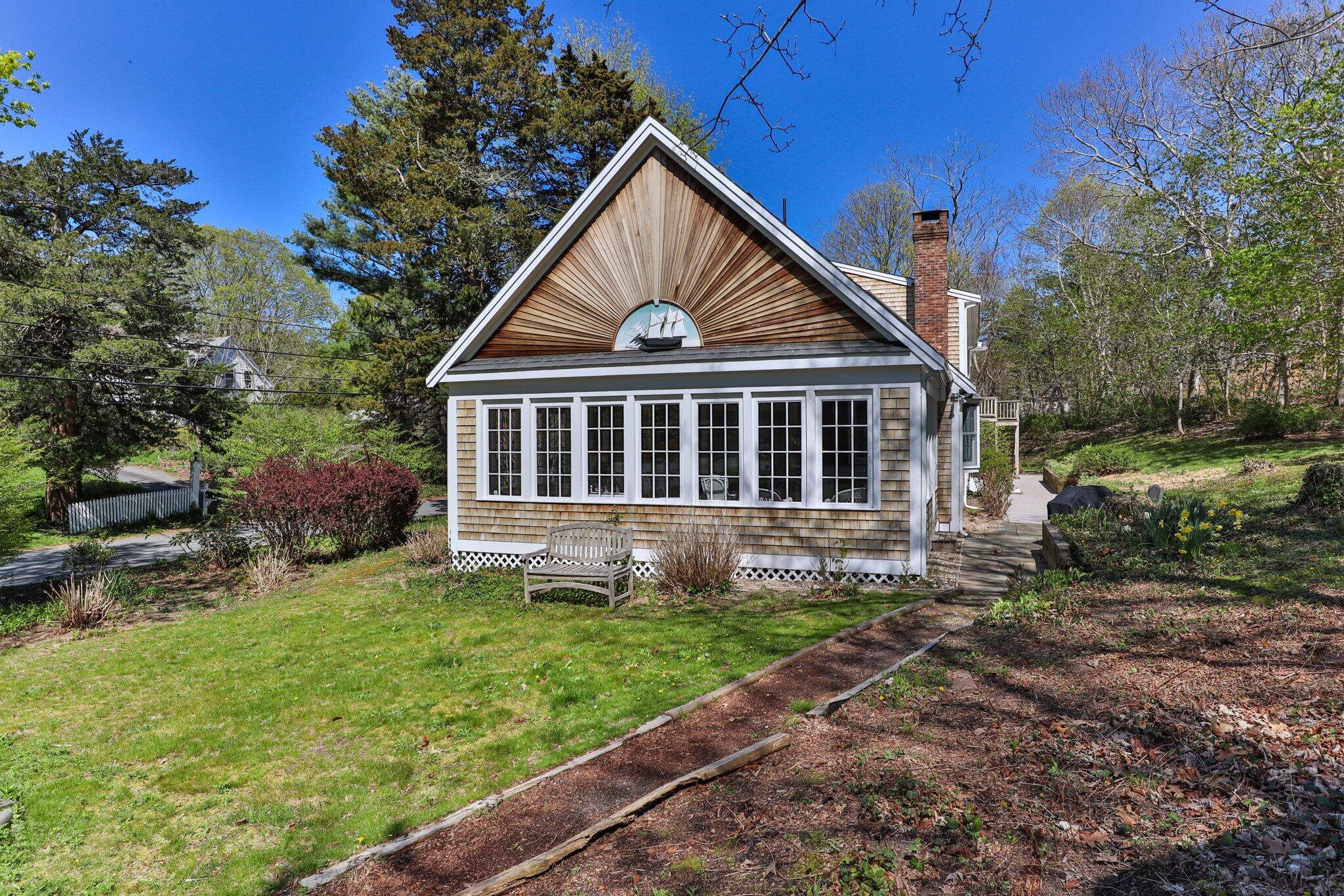35 Hamblen Farm Road Wellfleet, MA 02667 - Photo 52 of 62 a view of a house with a yard
