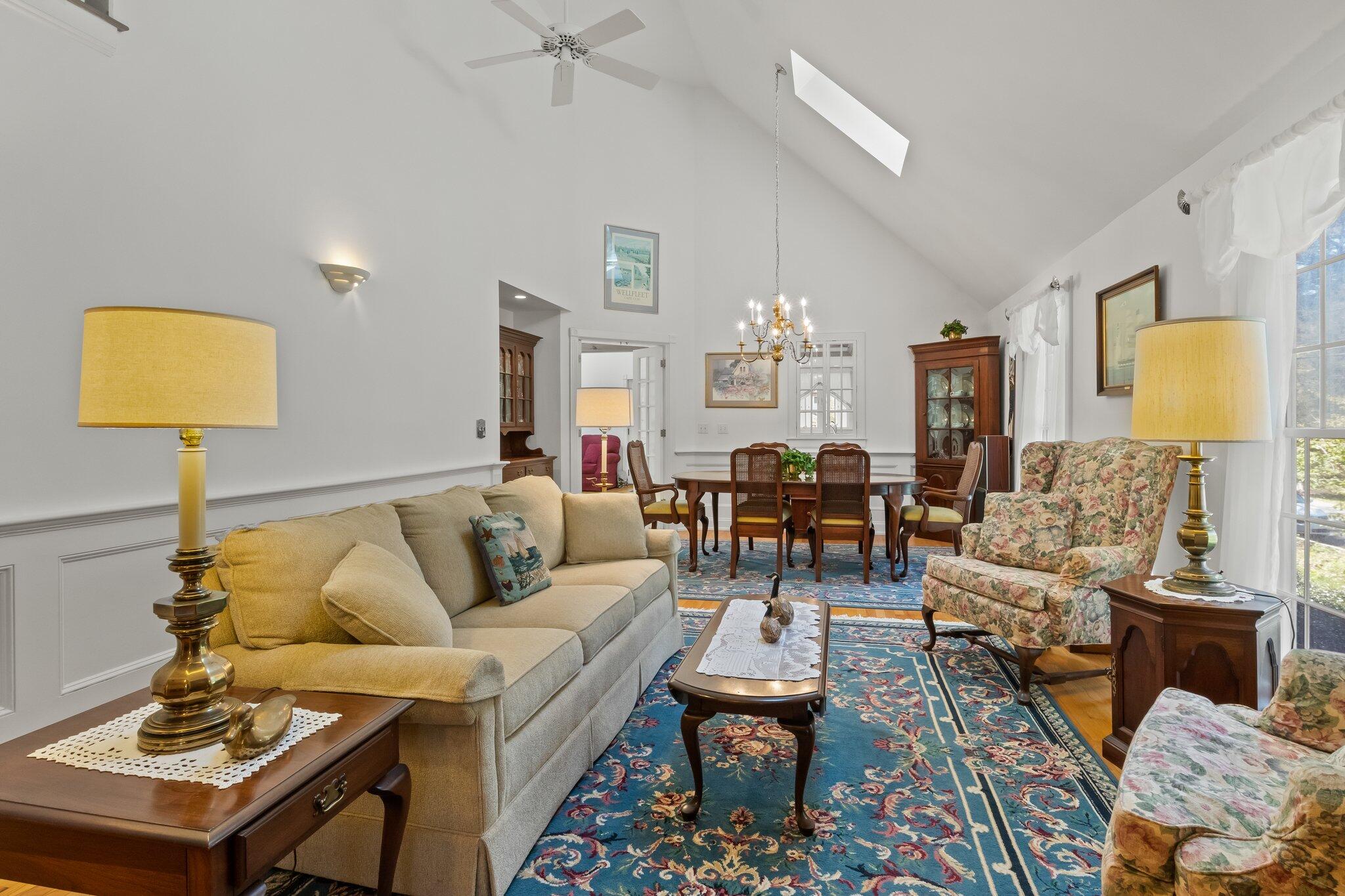 35 Hamblen Farm Road Wellfleet, MA 02667 - Photo 8 of 62 a living room with furniture and a lamp