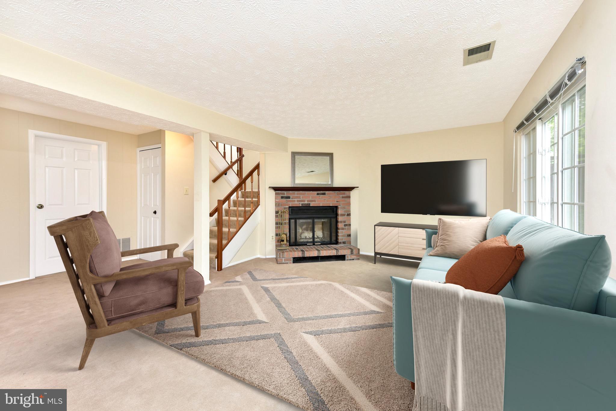 11524 Ivy Bush Court Reston, VA 20191 - Photo 17 of 31 Lower Level Family room walk-out Virtually Staged