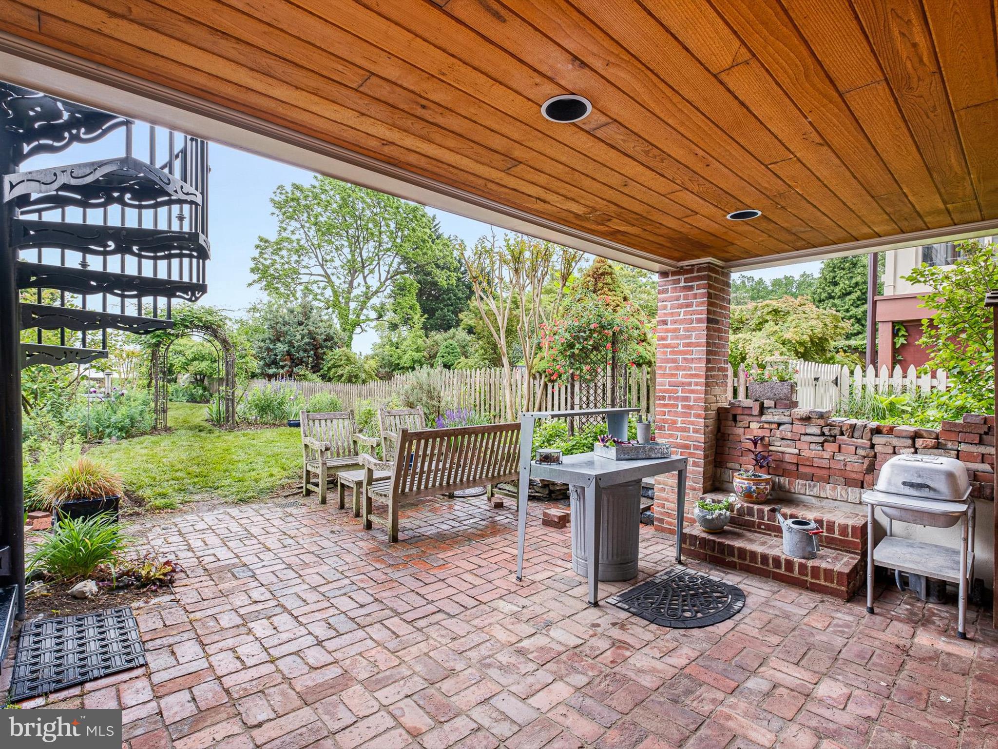 13 The Strand New Castle, DE 19720 - Photo 17 of 45 Brick patio through the garden to the DE river