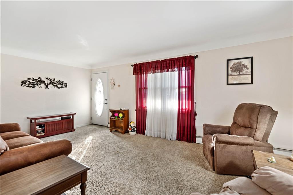 1007 Thermo Village Road New Stanton, PA 15672 - Photo 11 of 21 a living room with furniture