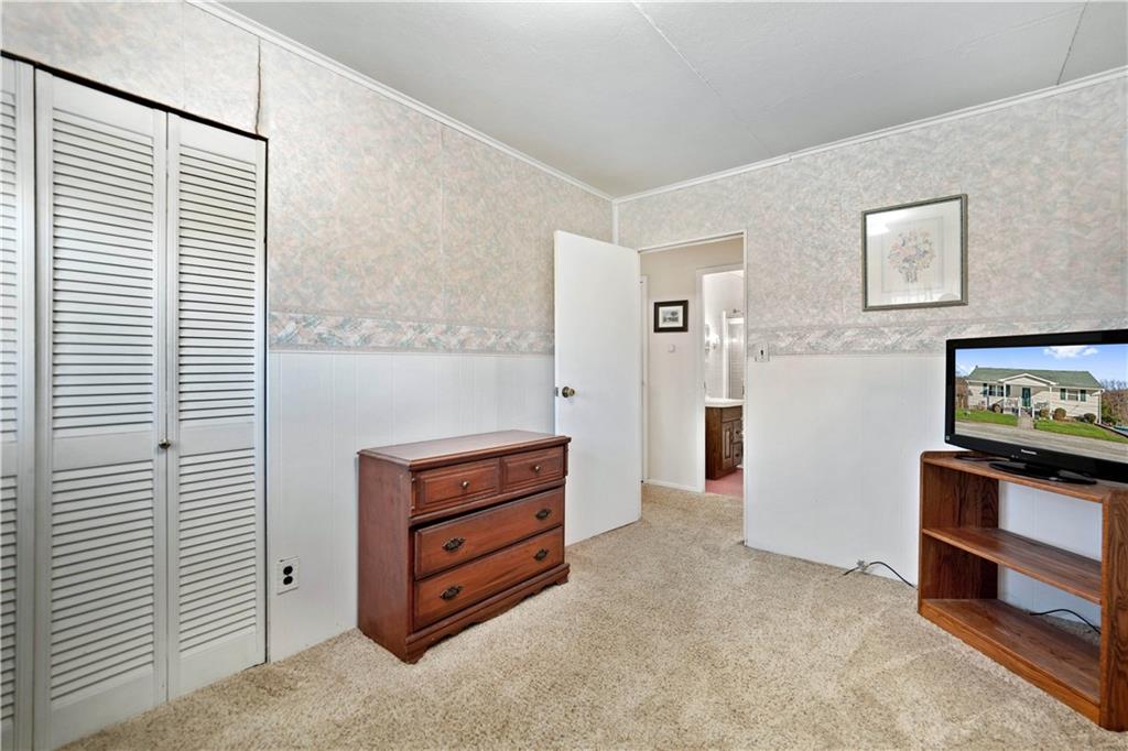 1007 Thermo Village Road New Stanton, PA 15672 - Photo 19 of 21 a view of room with window and cabinet