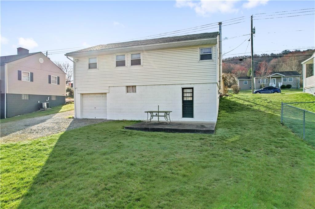 1007 Thermo Village Road New Stanton, PA 15672 - Photo 3 of 21 a view of a house with a backyard
