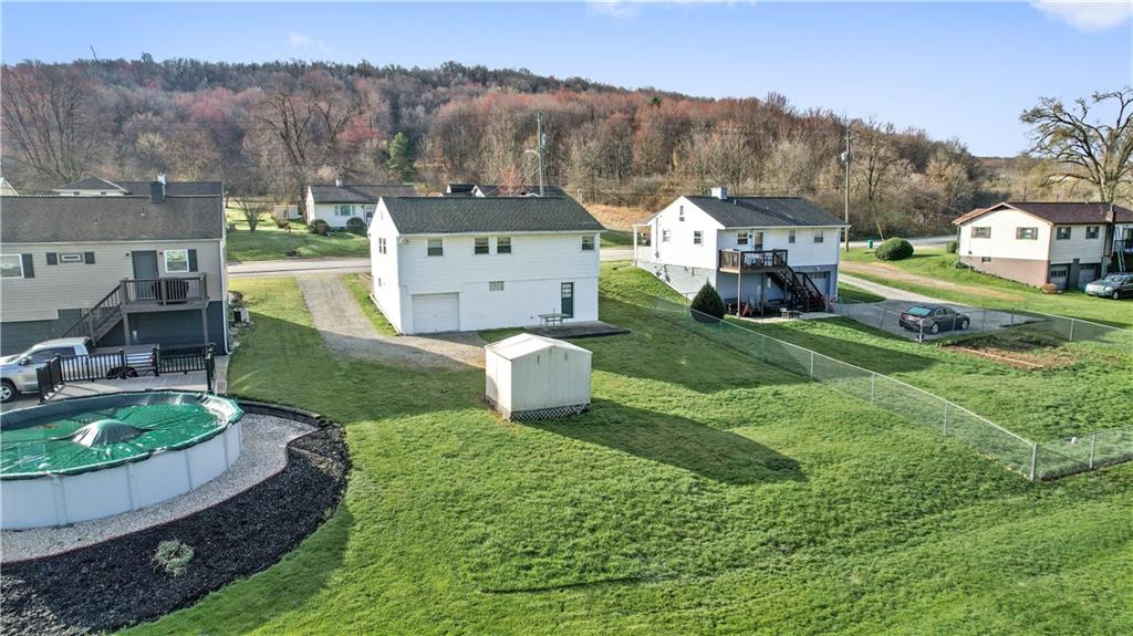 1007 Thermo Village Road New Stanton, PA 15672 - Photo 4 of 21 a view of a house with a garden