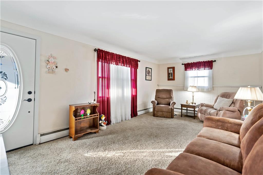1007 Thermo Village Road New Stanton, PA 15672 - Photo 10 of 21 a living room with furniture and a window