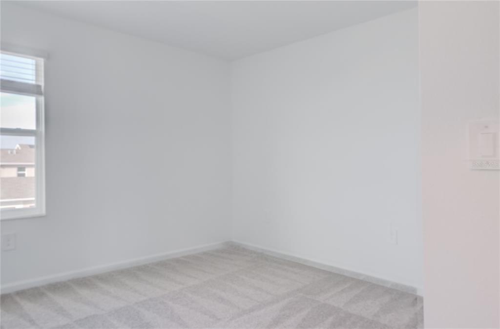 15627 Water Spring Boulevard Winter Garden, FL 34787 - Photo 18 of 45 a view of an empty room