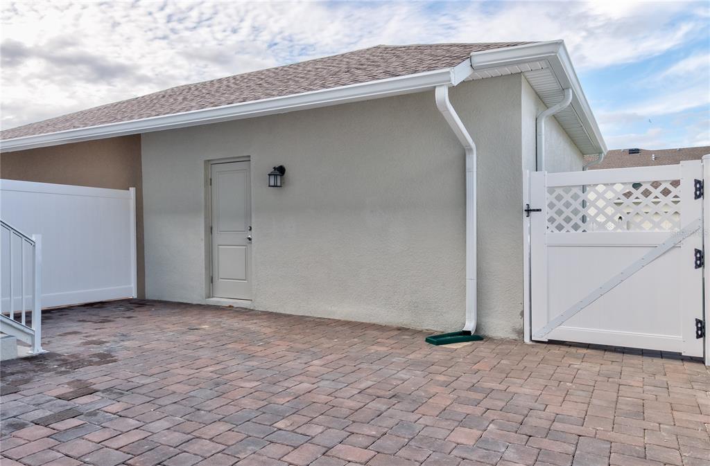 15627 Water Spring Boulevard Winter Garden, FL 34787 - Photo 36 of 45 a view of a house with a garage