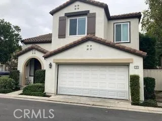 a front view of a house with garage