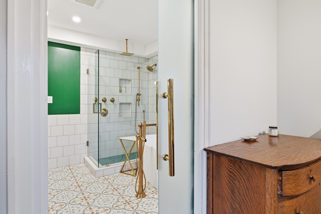 27 Lexington Avenue Holyoke, MA 01040 - Photo 22 of 42 a bathroom with a sink and shower